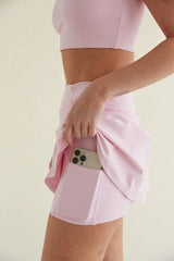 Avery Smoothing Flare Tennis Skort in Pink